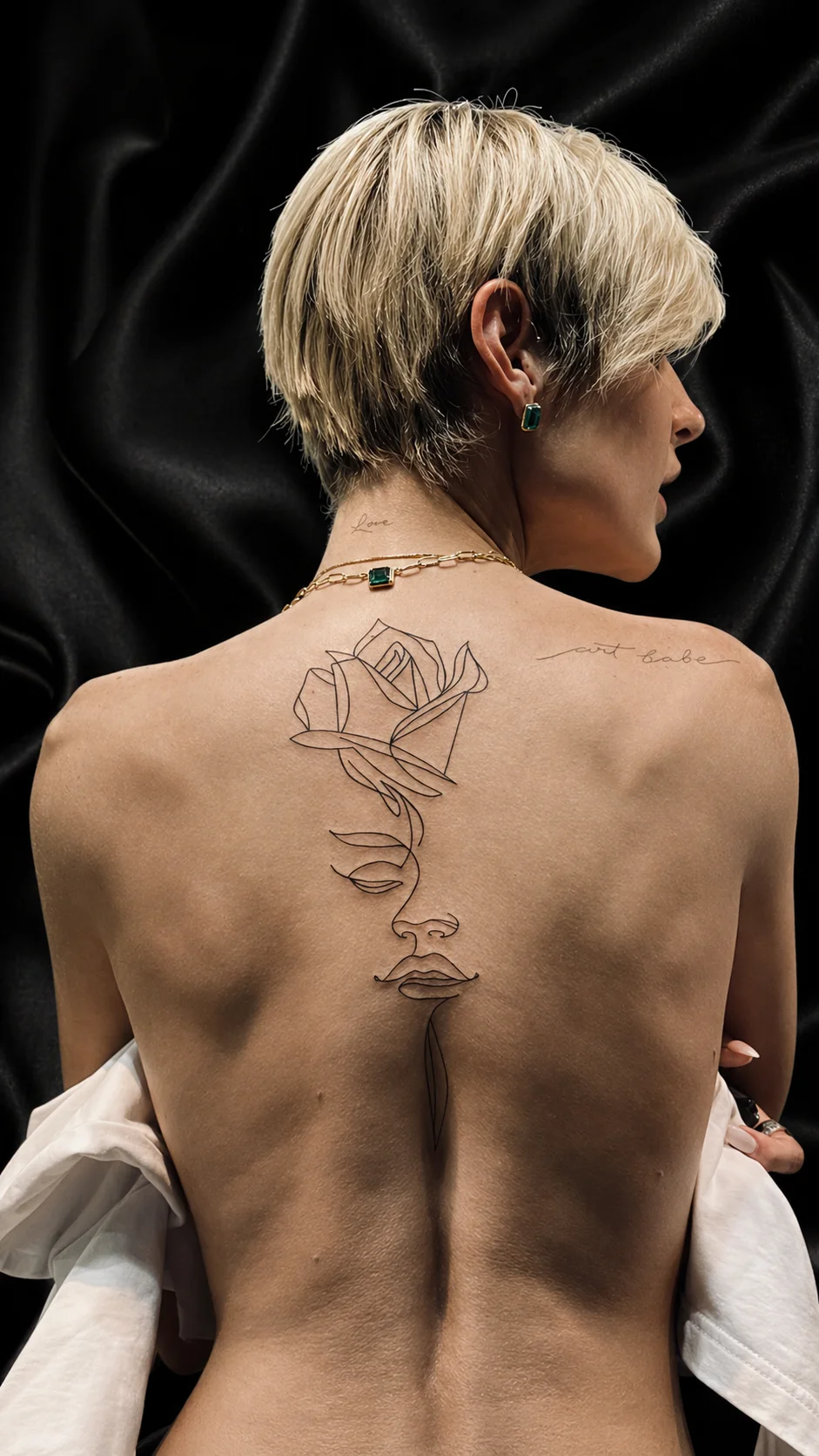 Rose back tattoo