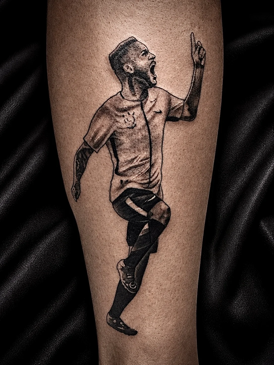 Soccer player tattoo