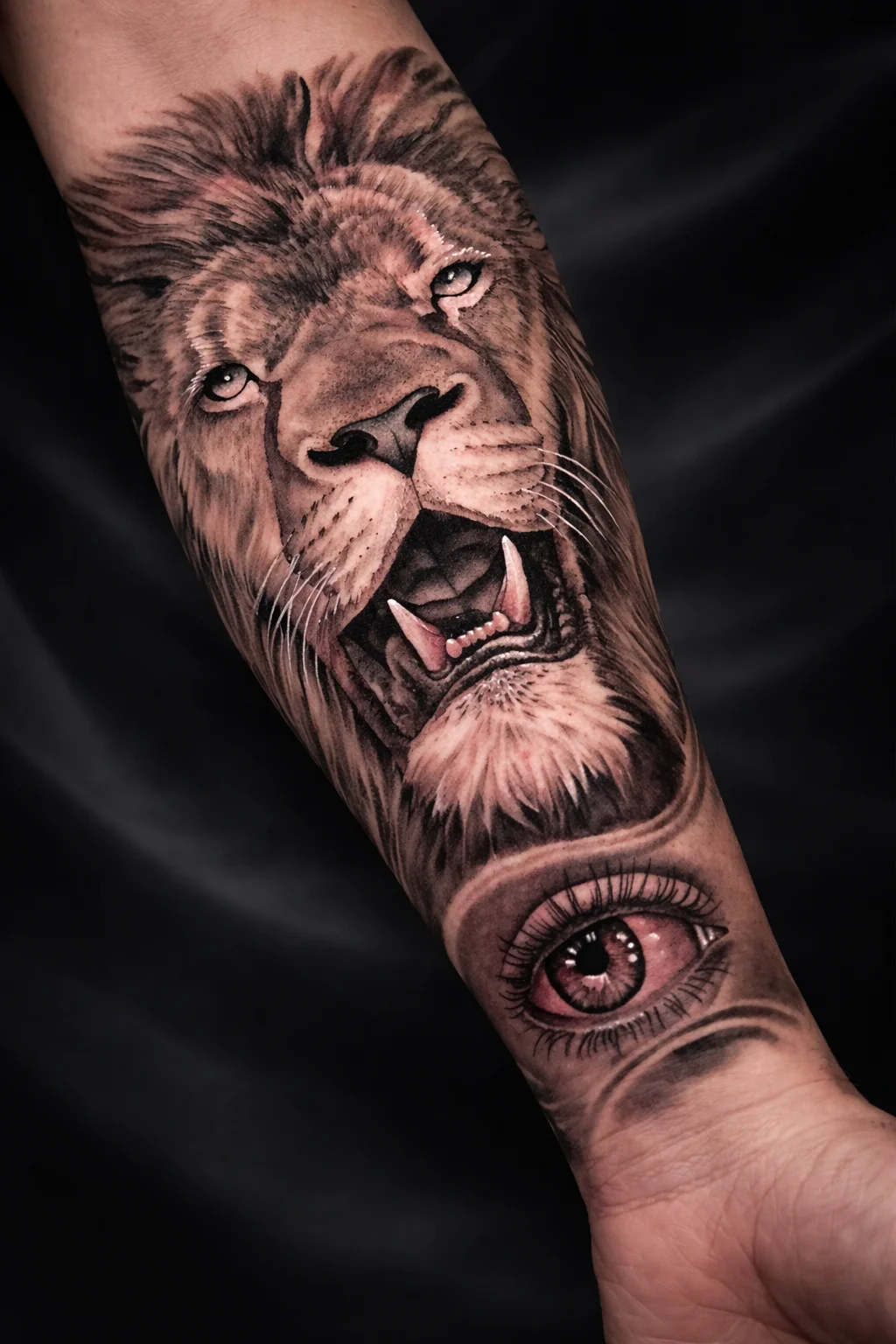 Lion with eye tattoo