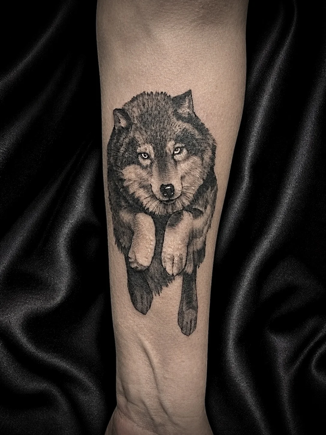 Running wolf tattoo