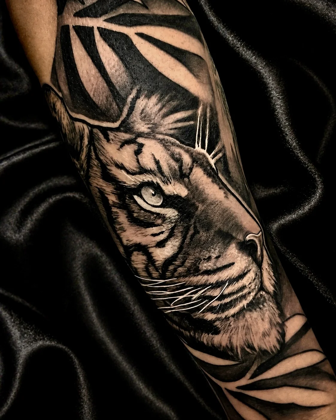 Tiger with leaves tattoo